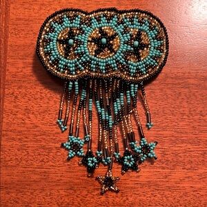 Hand beaded, leather backed hair clip.  New without tag